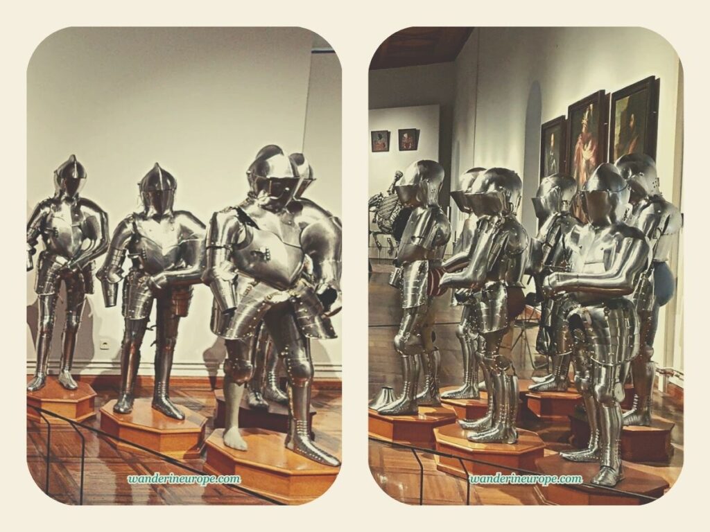 Beautifully preserved medieval armors of different heroes in the armory of Ambras Castle, Innsbruck, Austria