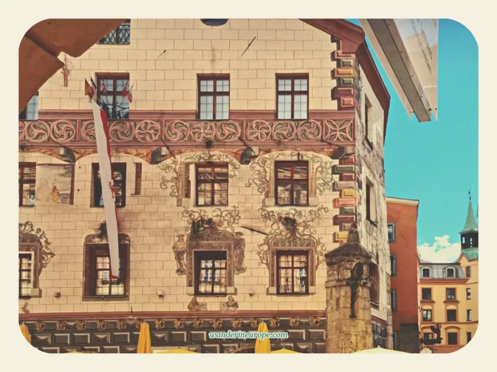 Eye-catching facade of Gasthof Goldener Adler along Herzog-Friedrich-Straße in Old Town Innsbruck, Austria