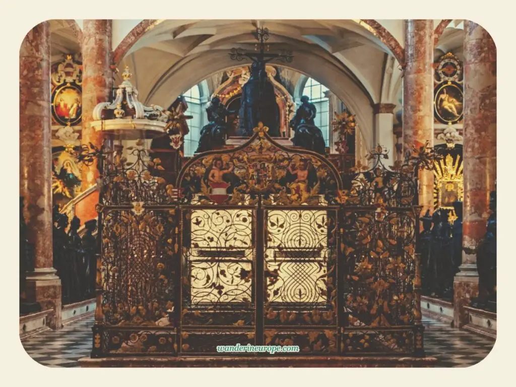The intricate rear view of Maximilian I's cenotaph in Court Church (Hofkirche) in Innsbruck, Austria
