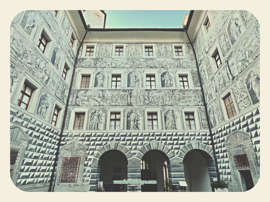 The spectacular murals in the courtyard of Ambras Castle, Innsbruck, Austria