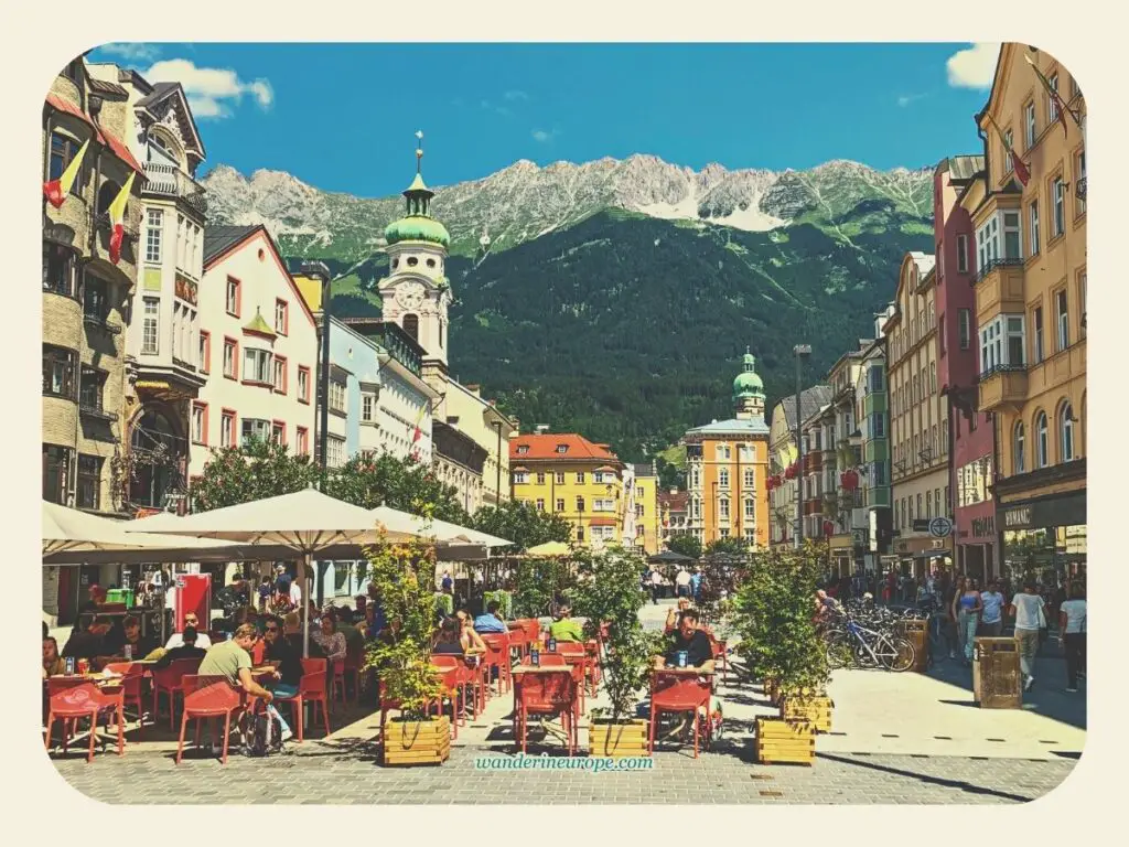 The view of Nordkette from a street in Old Town Innsbruck, Austria