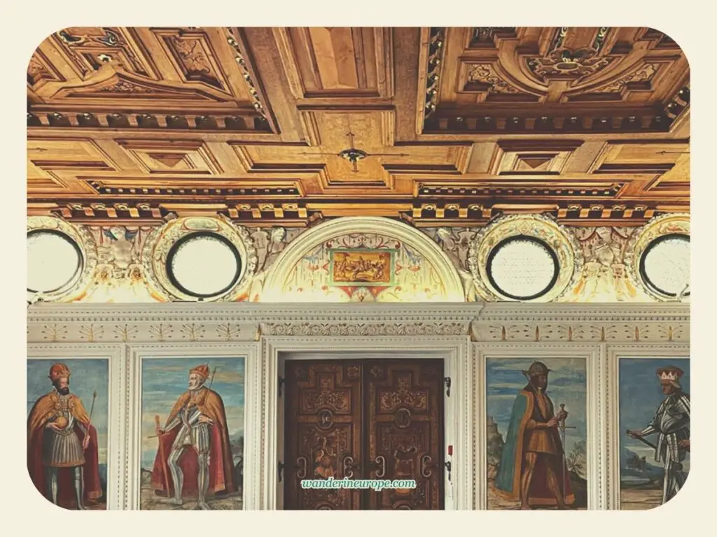 Woodcrafts (door and ceiling) and paintings inside the Spanish Hall in Schloss Ambras, Innsbruck, Austria