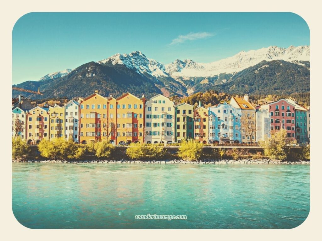The most iconic and picturesque Innsbruck Colorful Houses with Nordkette Mountain Range, seen from Marktplatz in Old Town Innsbruck, Austria