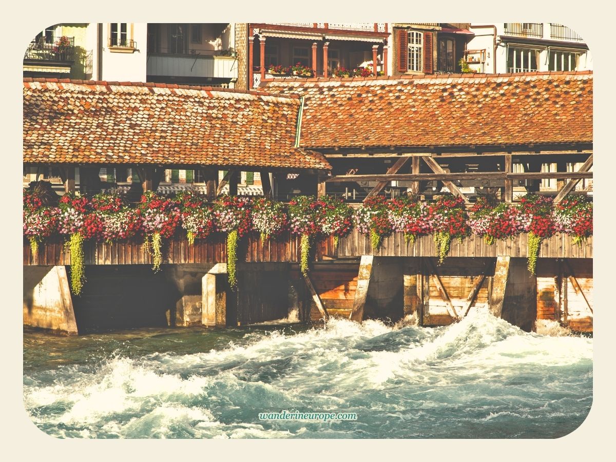 Beautiful Flowers decorating the wooden bridge during warmer months in Thun, Switzerland
