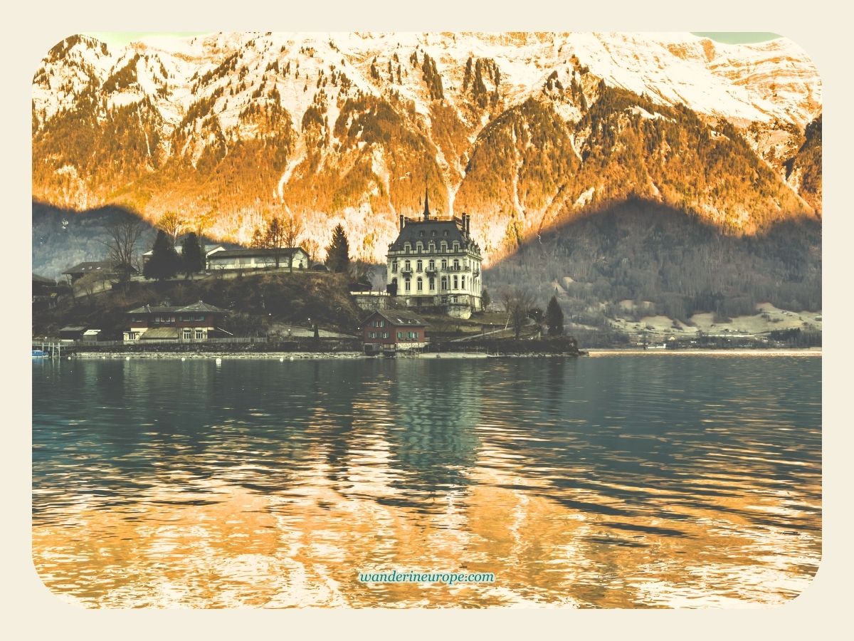 Lake Brienz with a calm surface reflecting Seeburg Castle, Day 6 Switzerland Itinerary