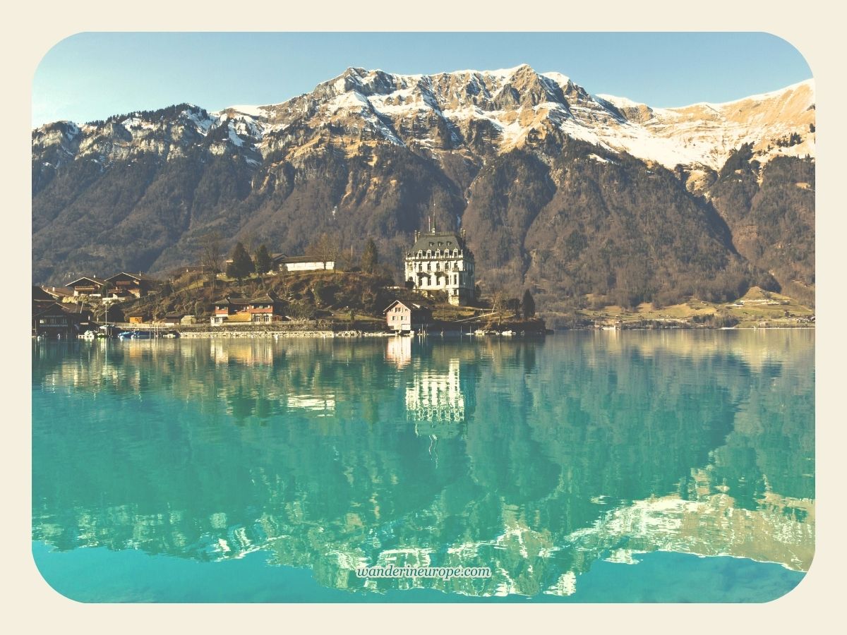 Schloss Seeburg and its beautiful reflection over Lake Brienz, Jungfrau Region, Switzerland