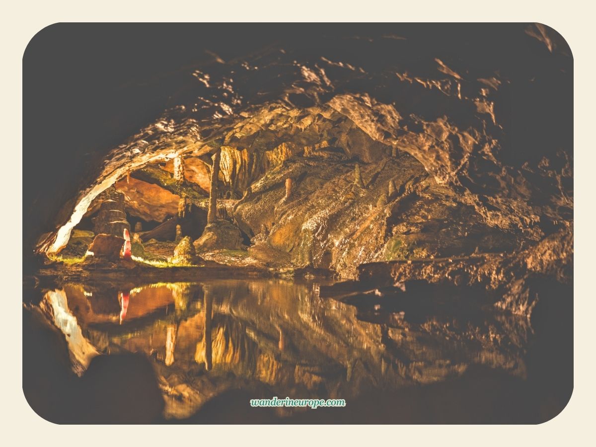 Stalagmites, stalactites, and mirror pools inside Saint Beatus Caves, Lake Thun, Switzerland