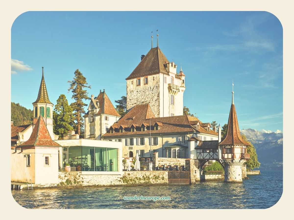The picture-perfect appearance of Oberhofen Castle from the castle’s dock in Lake Thun, Switzerland