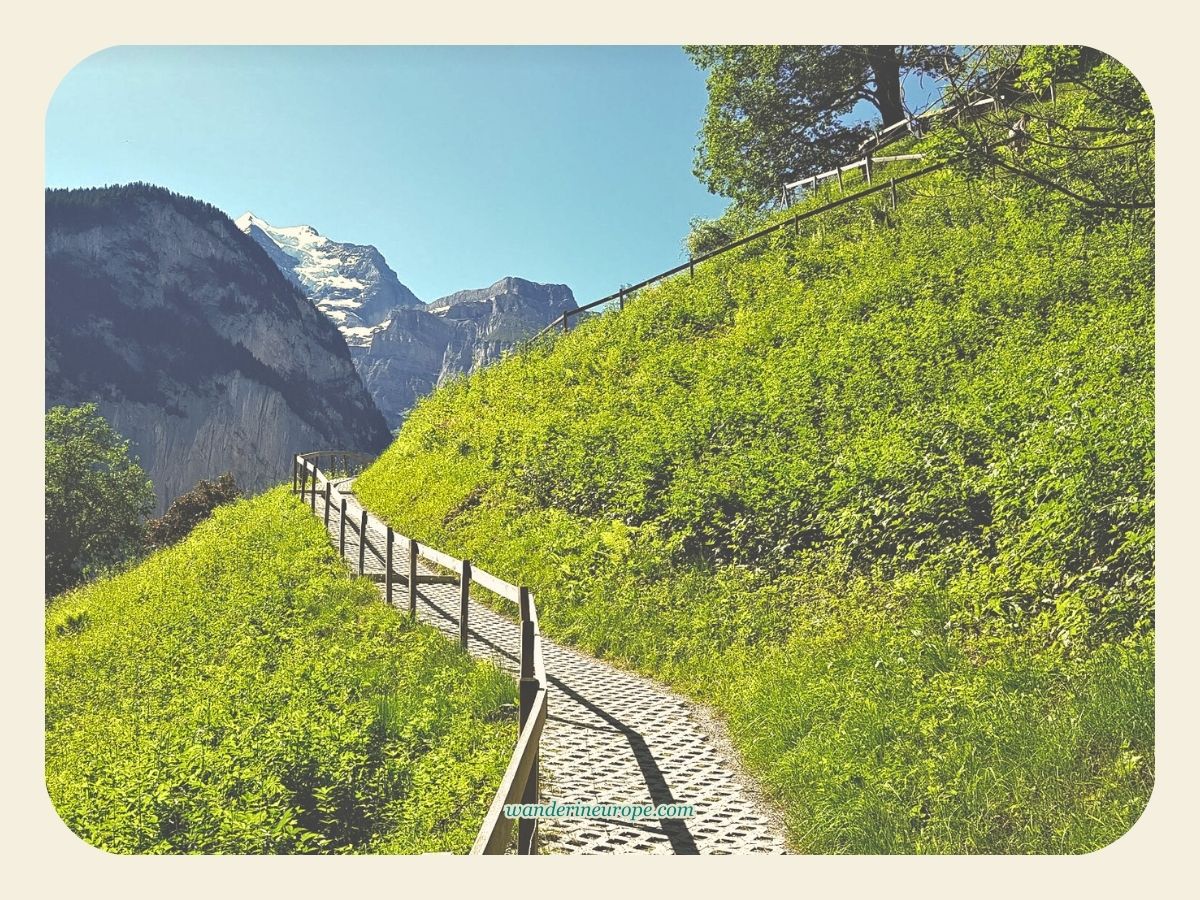 The view of the winding hiking trail to the viewpoint behind Staubbach Falls in Lauterbrunnen Valley, Switzerland