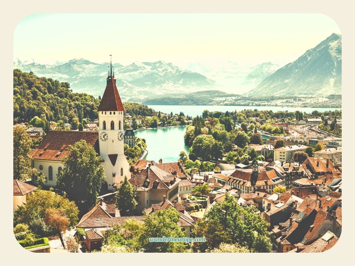 Thun Old Town, Lake Thun, and the Bernese Alps in the backdrop. Shot taken at The Castle’s Tower in Thun, Switzerland