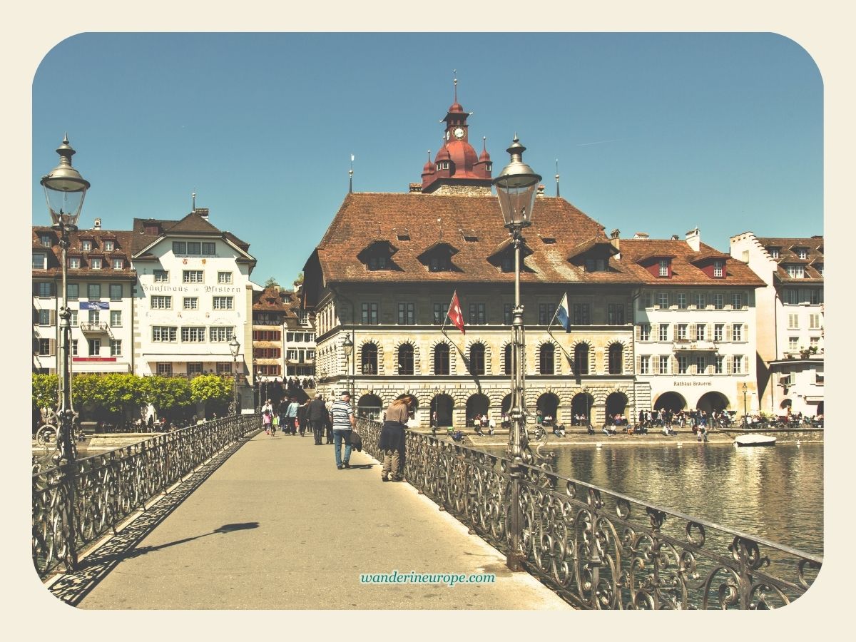 View of Rathaus from Rathaussteg or Reuss River in Lucerne, Switzerland