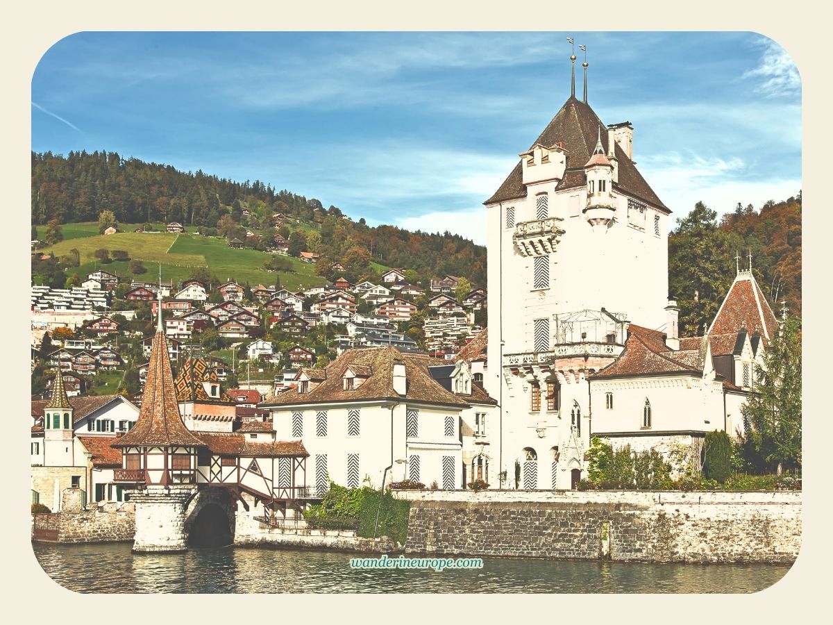 View of the Oberhofen Castle from the boat in Lake Thun, Switzerland