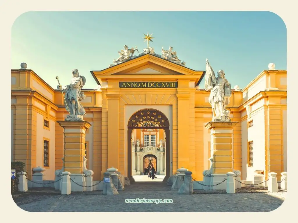 Golden hour at the gate of Melk Abbey, day trip destination from Vienna, Austria