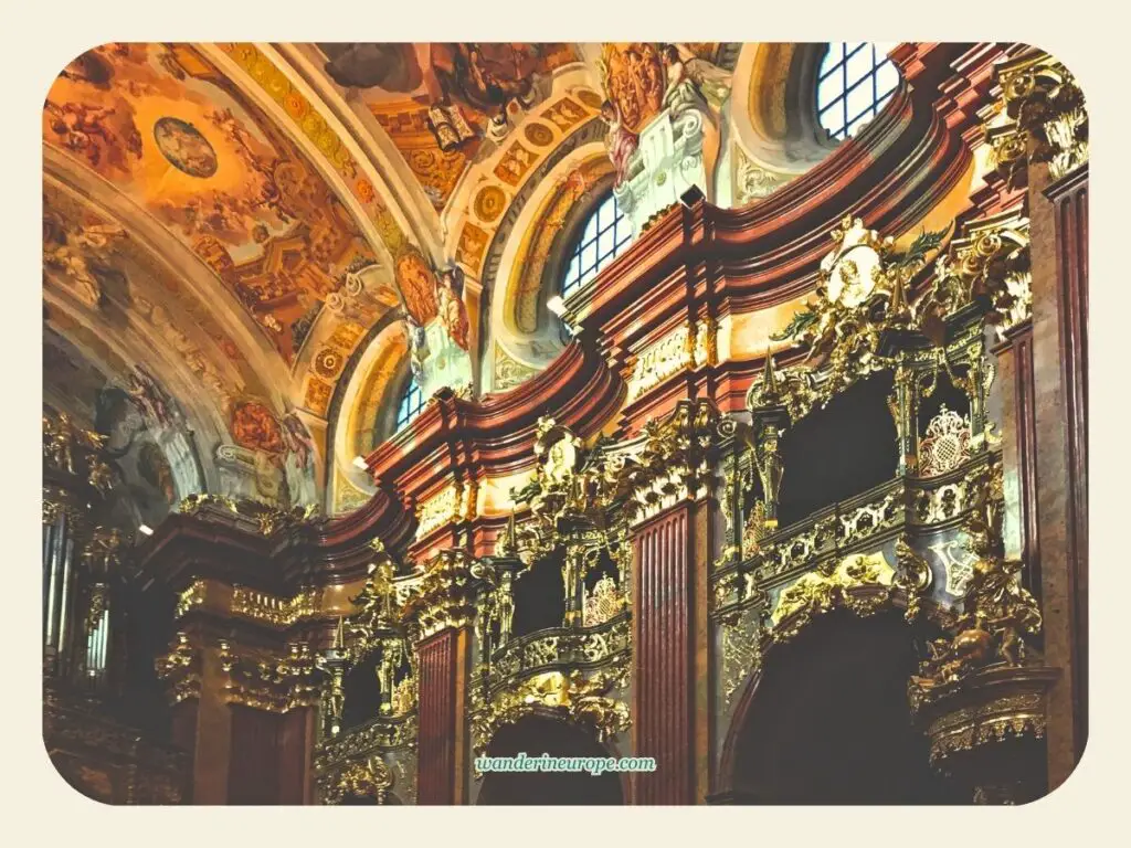 Heavily adorned walls of the church of Melk Abbey, a must see place from Vienna, Austria