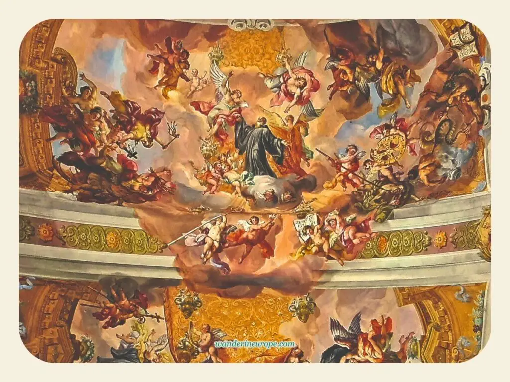 Saints and angels depicted in the frescoes of the church of Melk Abbey, a destination to visit from Vienna, Austria